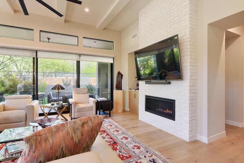 Cozy Gas Fireplace w/Textured Brick