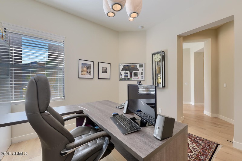 Office/Den Overlooks Front Courtyard