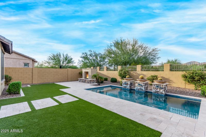Water Feature, Fireplace, and Views!