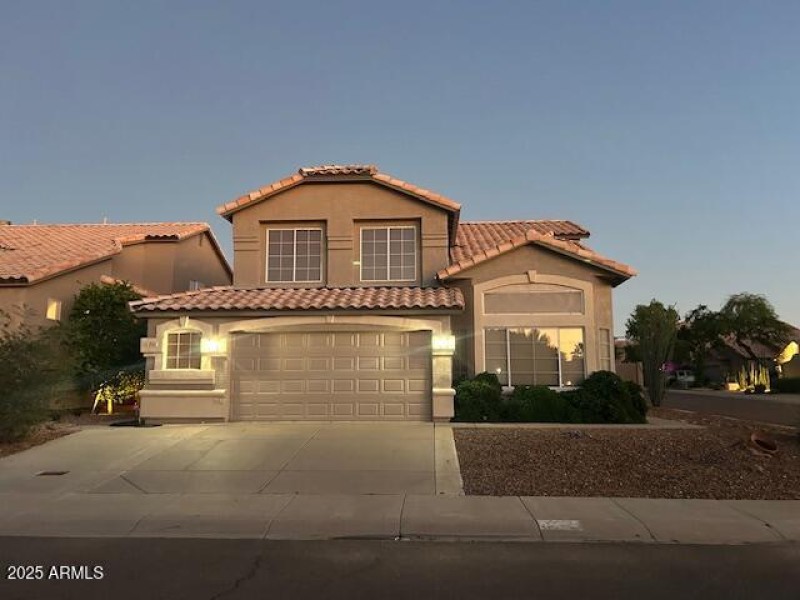 Evening view of this beautiful home