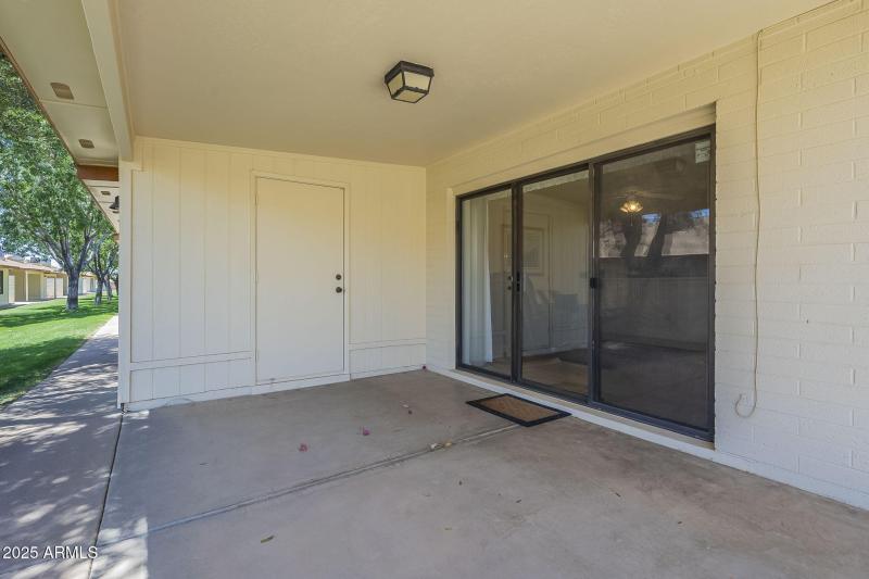 South-facing patio with storage