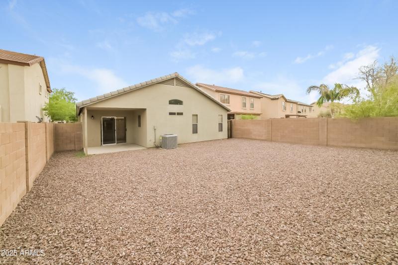 1012394.8410 S 49TH LN - Rear View