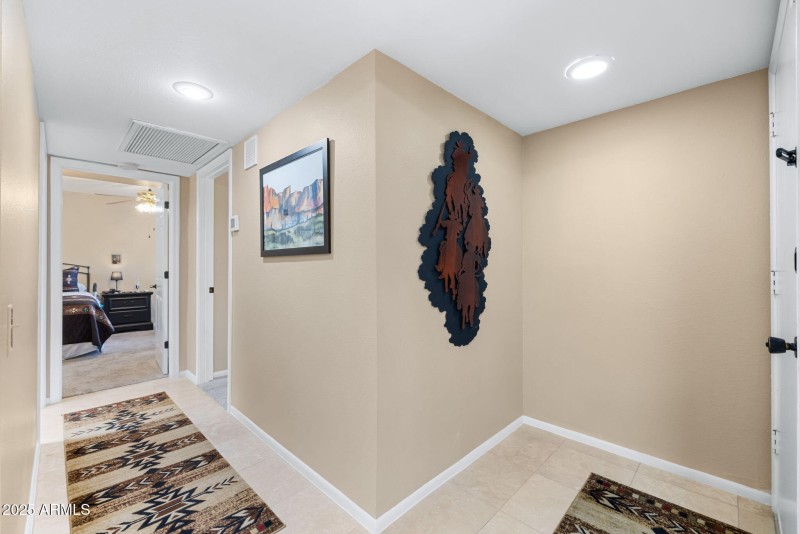 Foyer entry & hallway to 2 bedrooms & Ba