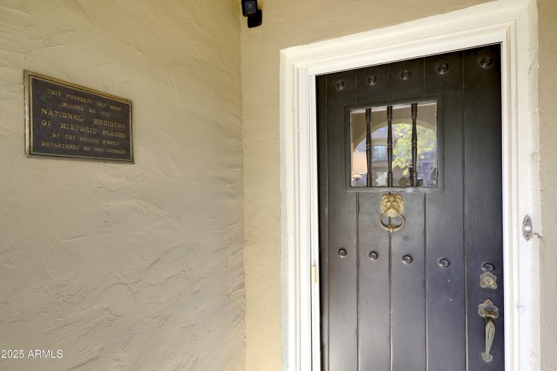 front door and historic plaque