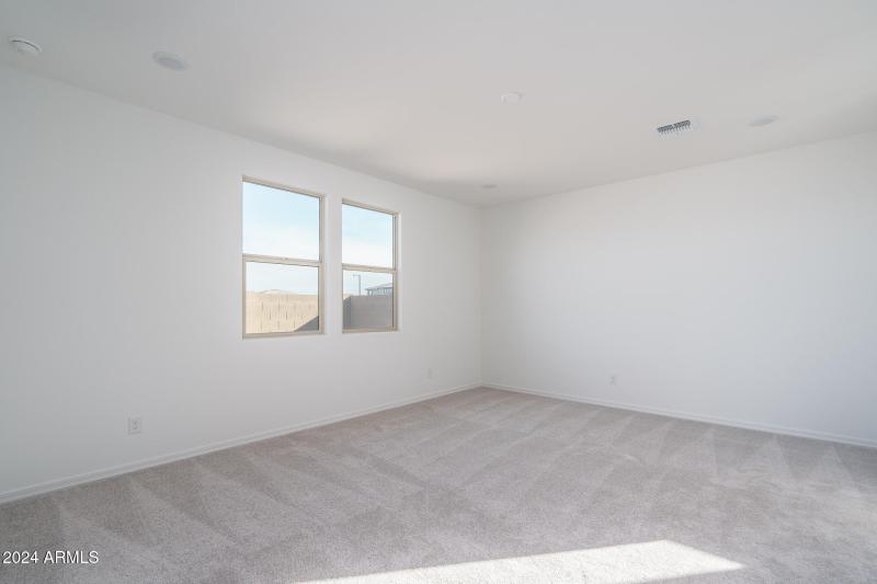 8) PRIMARY BEDROOM