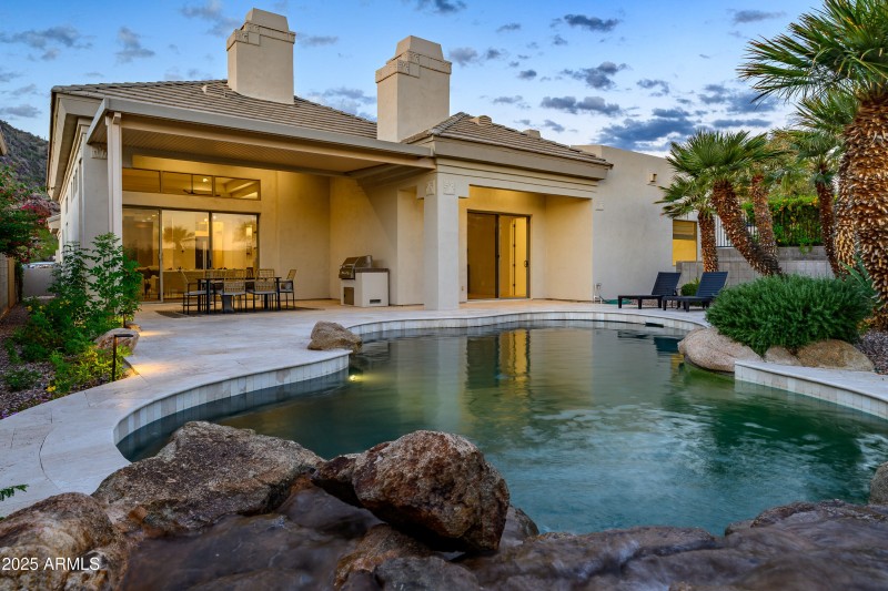 Backyard over Pool to Home