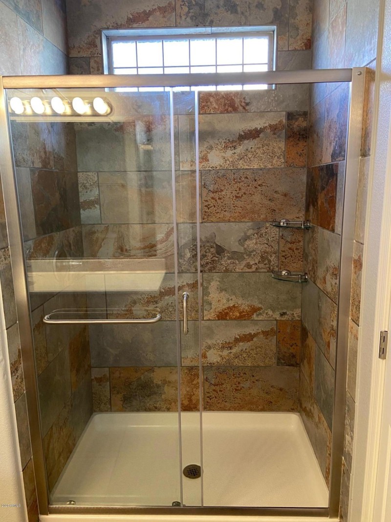 UPGRADED SHOWER W/GLASS DOORS