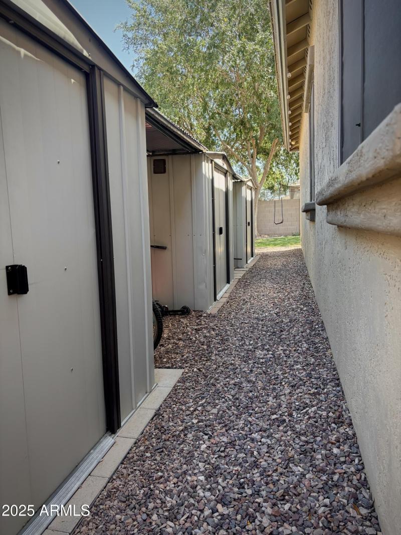 3 Sheds & 2 Covered Storage Areas