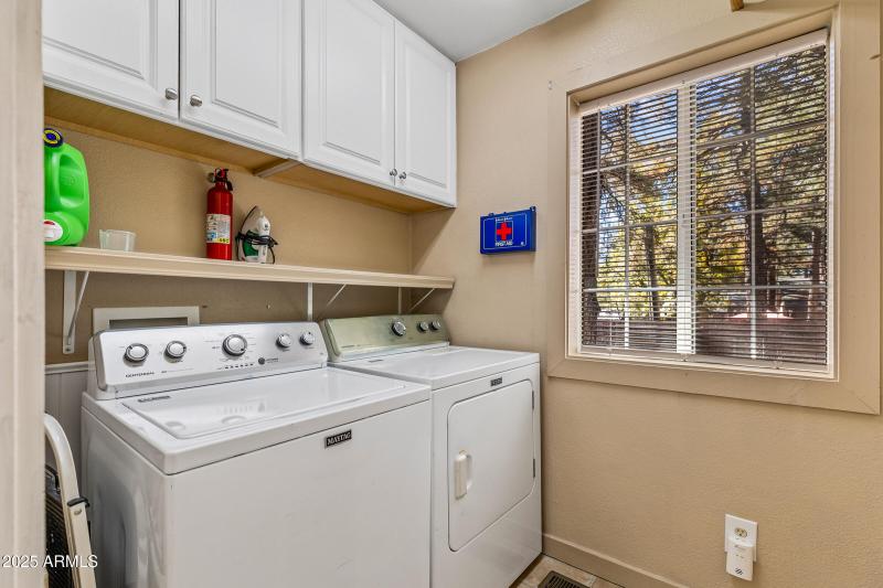 Separate laundry room and storage