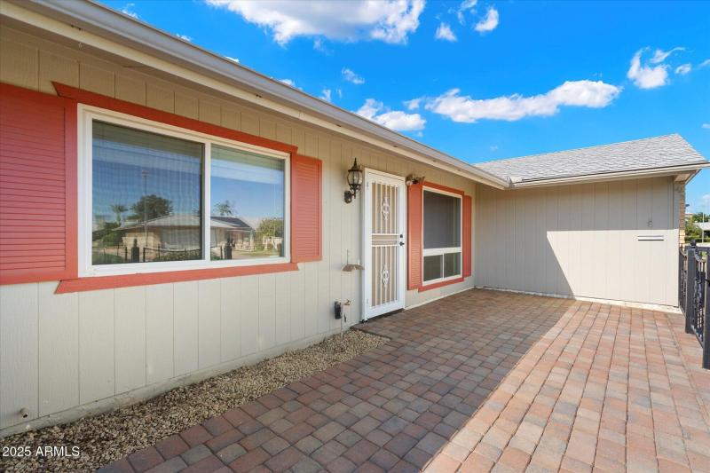 Inviting Front Patio with Brick Detail