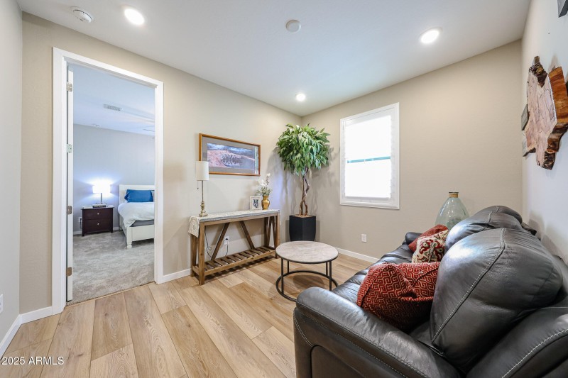 Sitting area looking into bedroom 2