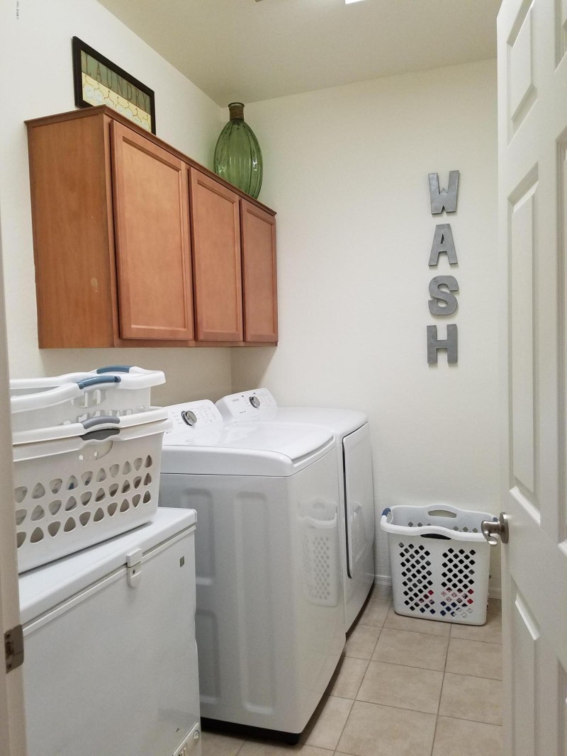 SPACIOUS LAUNDRY RM W/CABINET