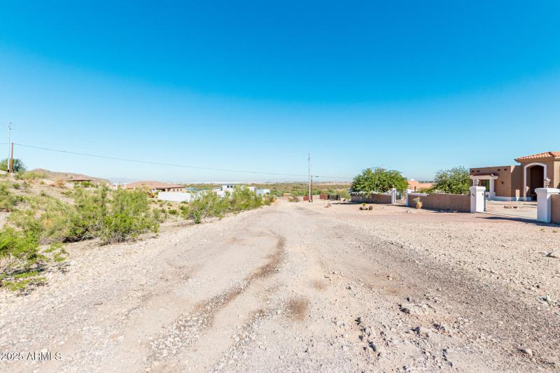 Road and neighbor to the north