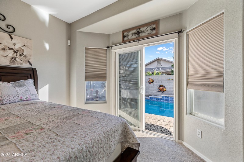 Door to backyard from primary