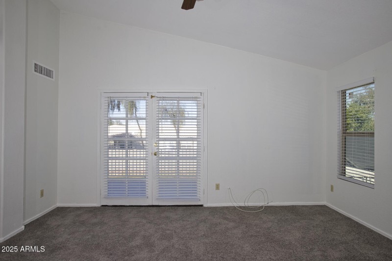 Master bedroom with exit to Balcony