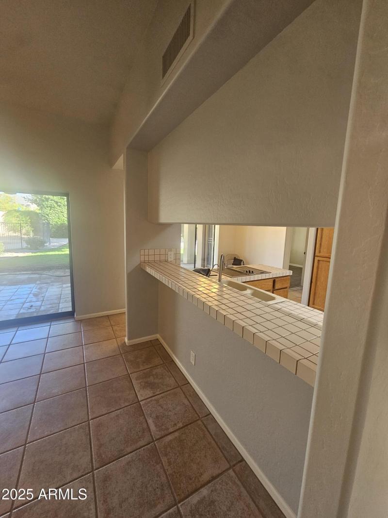 Breakfast Bar Backs to Family Room