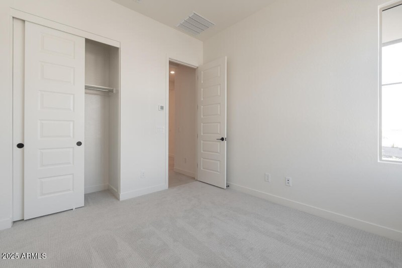 Tri Pointe Soleo 643 - Bedroom 2-1MLS