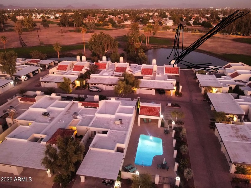 Drone shot of pool and Golf Course