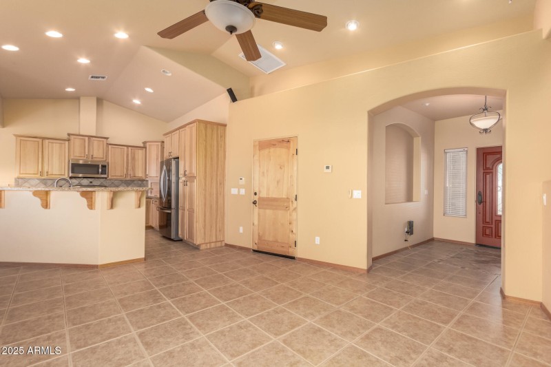 ENTRY INTO THE FAMILY ROOM/KITCHEN