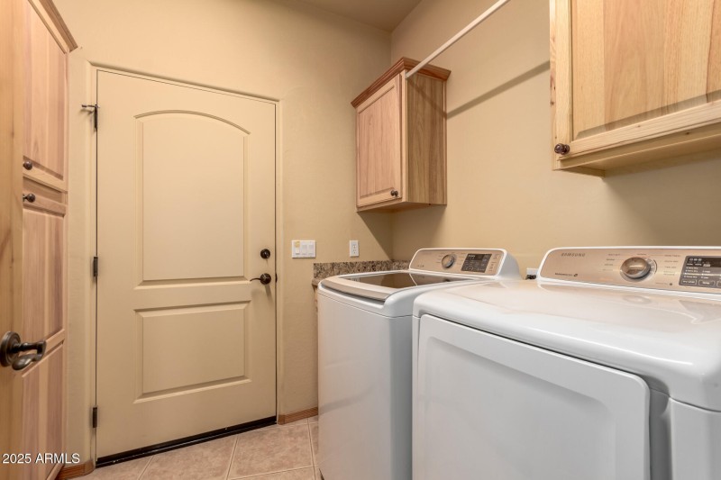 LAUNDRY ROOM WITH LOTS OF STORAGE