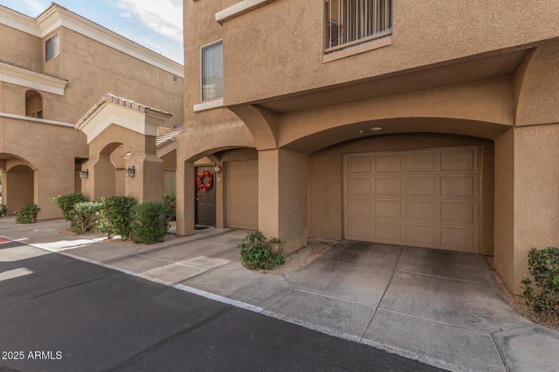 One car garage into the Condo