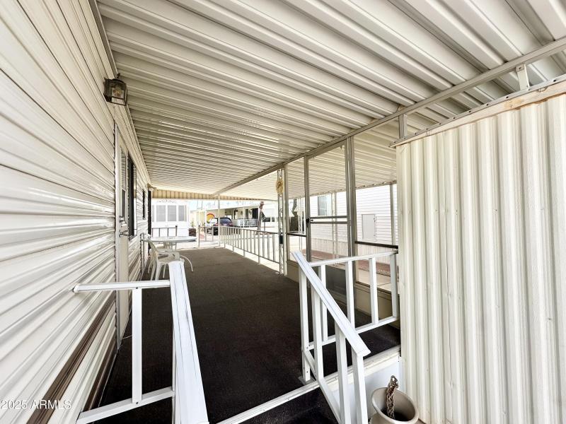 STEPS UP TO DECK FROM BACK PATIO