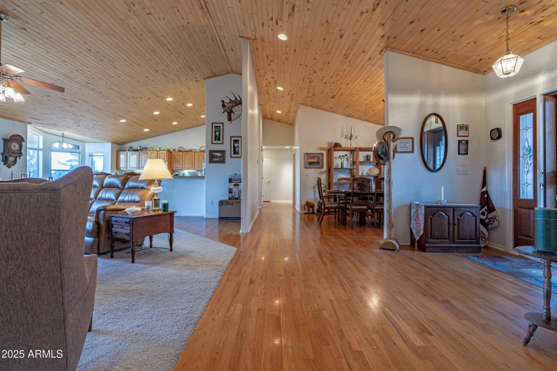 Hardwood Floors lead to Formal DR