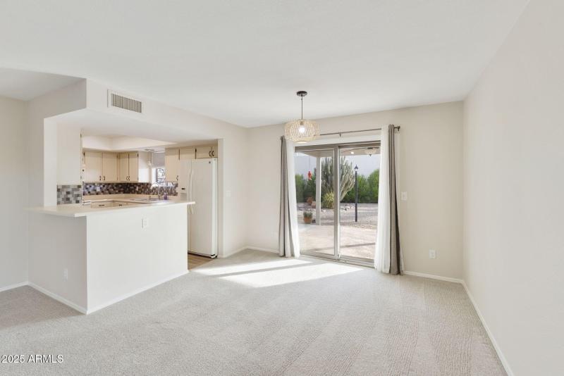 Patio access off family room/kitchen