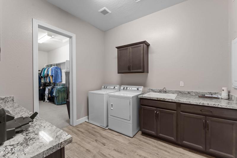 Laundry room with sink
