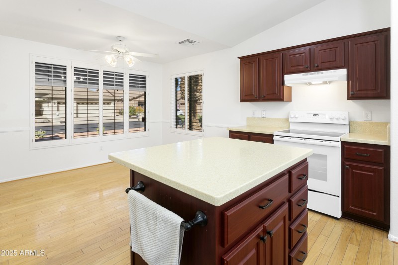 KITCHEN ISLAND AND EATING AREA