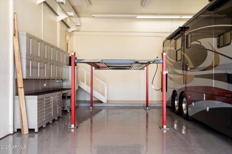 Impressive RV Garage w/ Lift & Storage