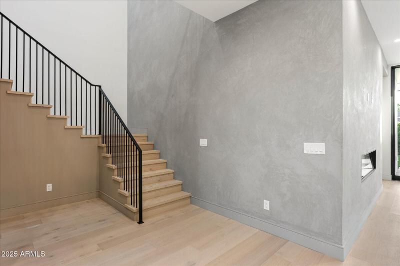 Stairway with custom plaster wall detail