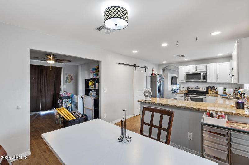 Dining, den and kitchen