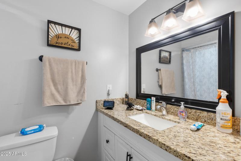 Guest bathroom with tub and shower combo