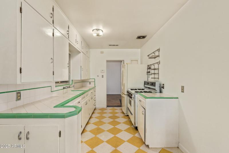 Vintage cabinets & tile countertops