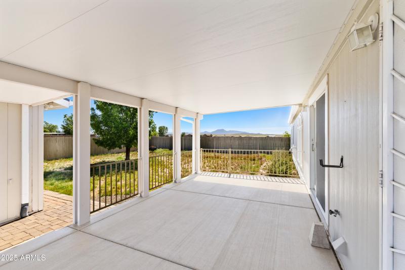 Separate smaller Fenced backyard