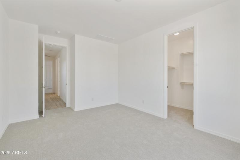 FRONT BEDROOM WITH W/ WALK IN CLOSET