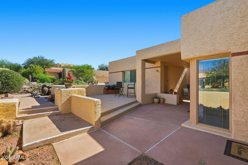 Raised patio has mountain views