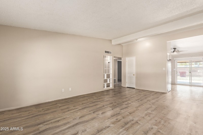 Living room facing kitchen