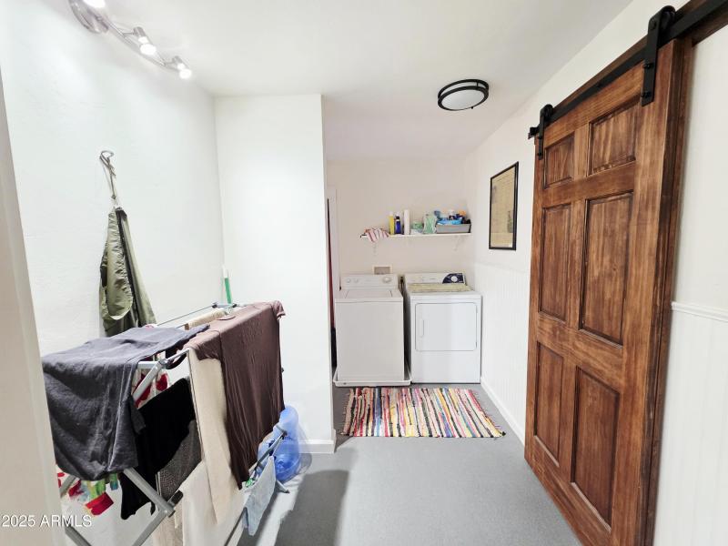 Laundry room, just off primary bedroom