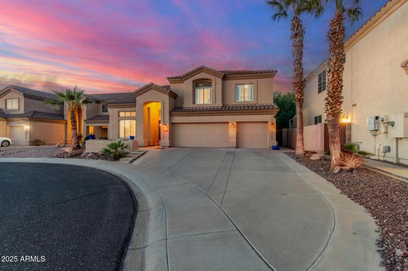 Front of home at sunset