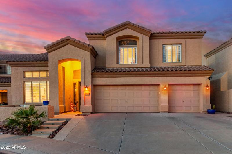 Front of home at sunset