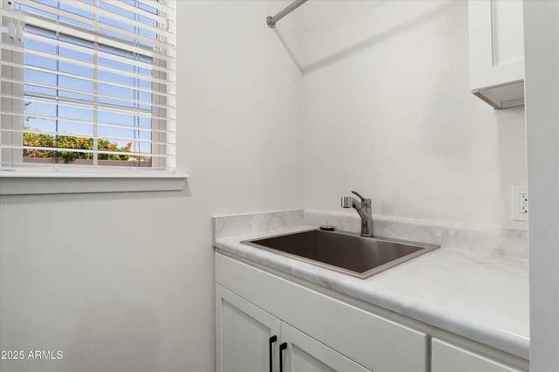SINK AT LAUNDRY ROOM