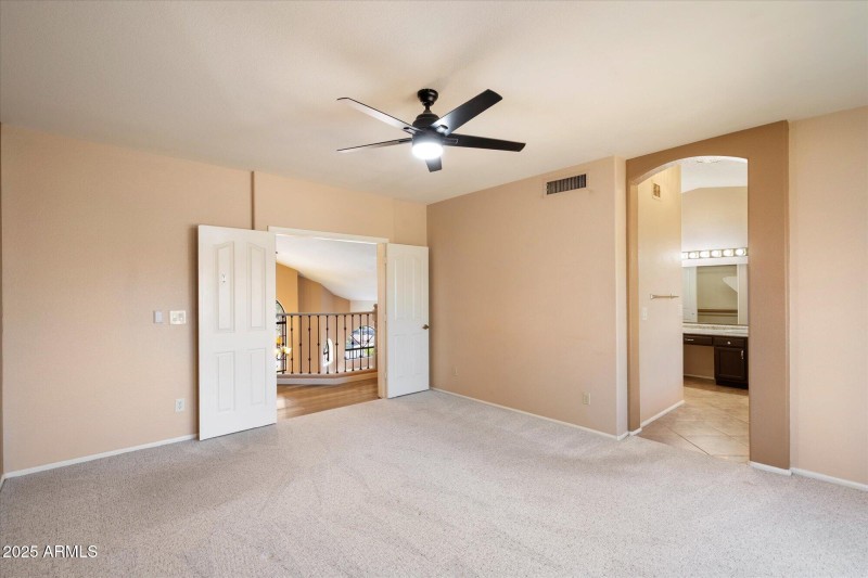 double doors in primary bedroom