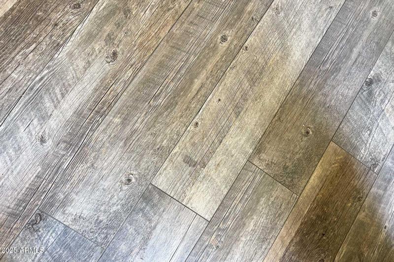 Porcelain tile floors throughout