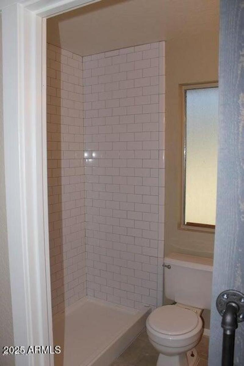 Primary Bathroom with Tiled Shower