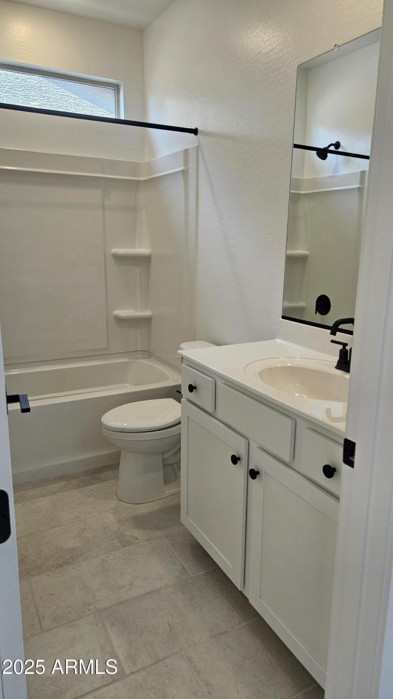 Full Bathroom with Dual Sinks and 2 Do