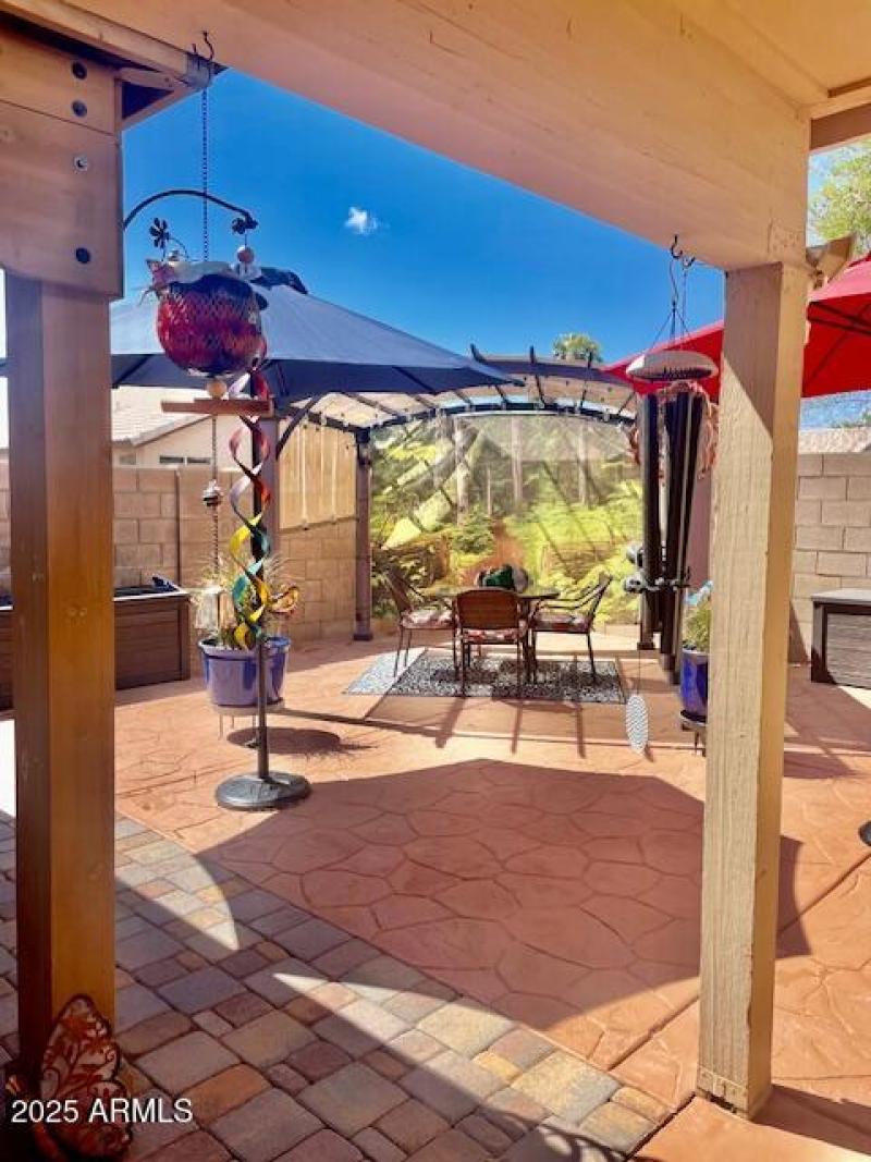 8x10 pergula with stamped concrete-paver