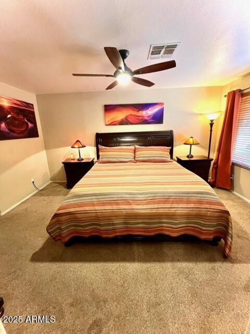 Large kingsized master bedroom 13