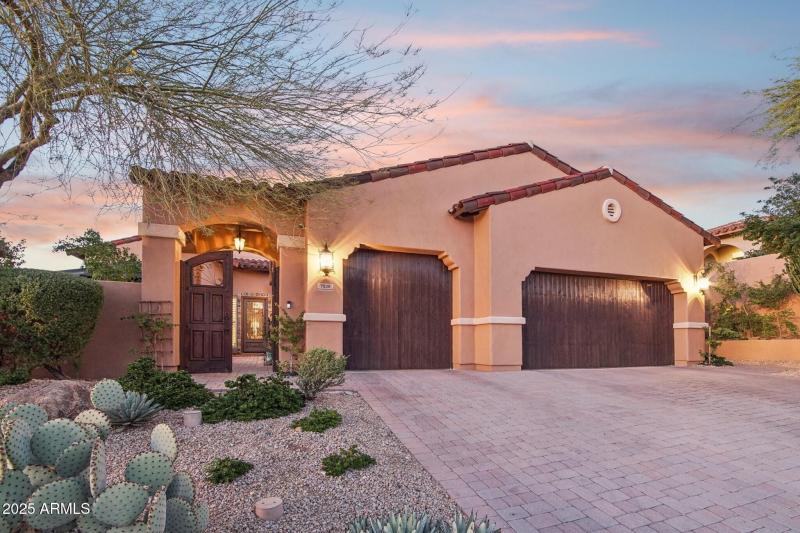 Gated Courtyard & 3-Car Garage